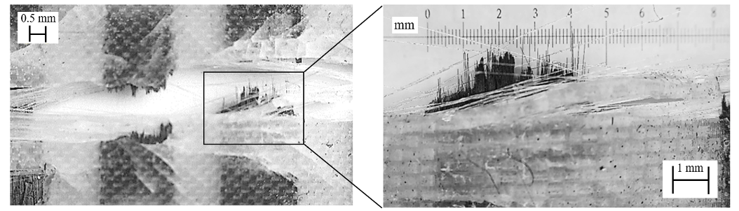 Photographs of the failure mode of the plain-weave fabric after tensile tests.